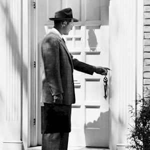 a sales man who is going door to door making cold calls