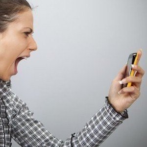 someone who is frustrated using their mobile device